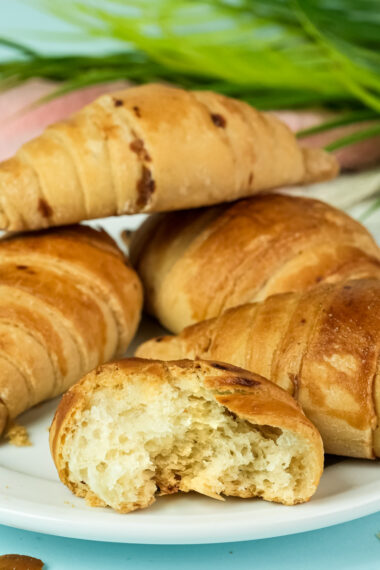 Cross-section of homemade croissant bread revealing airy texture
