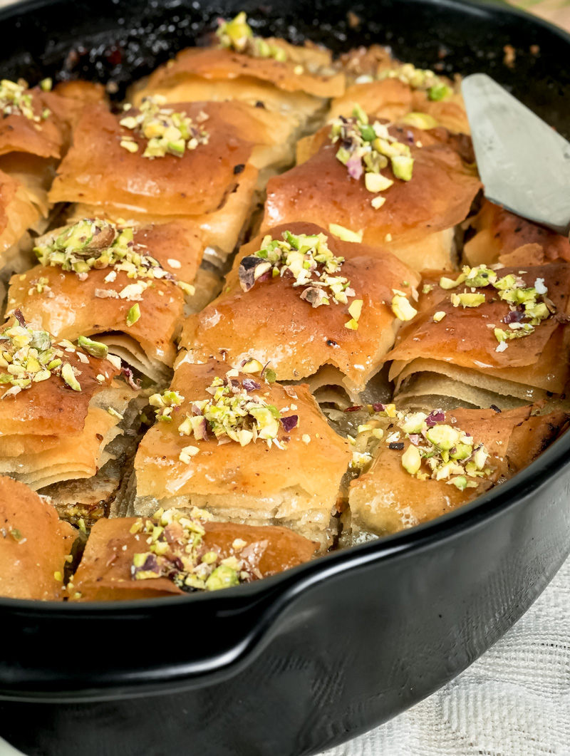Close-up of layered baklava with phyllo pastry and nuts