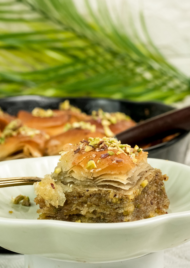 Cross-section view of layered pistachio baklava slice