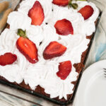 Beautifully decorated strawberry earthquake cake ready to serve