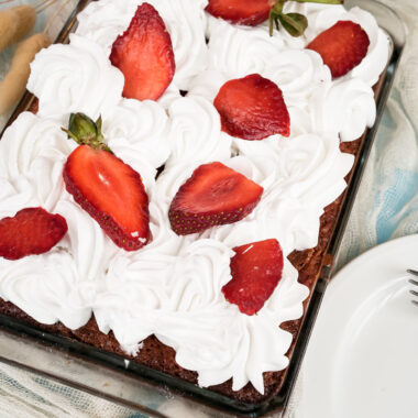 Beautifully decorated strawberry earthquake cake ready to serve