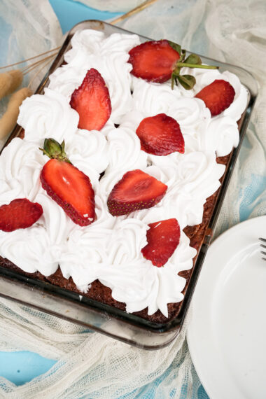 Beautifully decorated strawberry earthquake cake ready to serve
