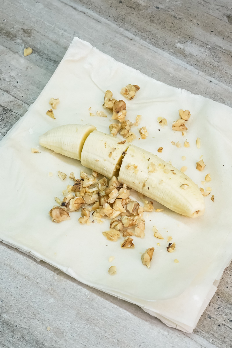 Banana slices with chopped walnuts for homemade strudel