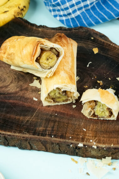 Close-up of banana strudel slice with walnut filling