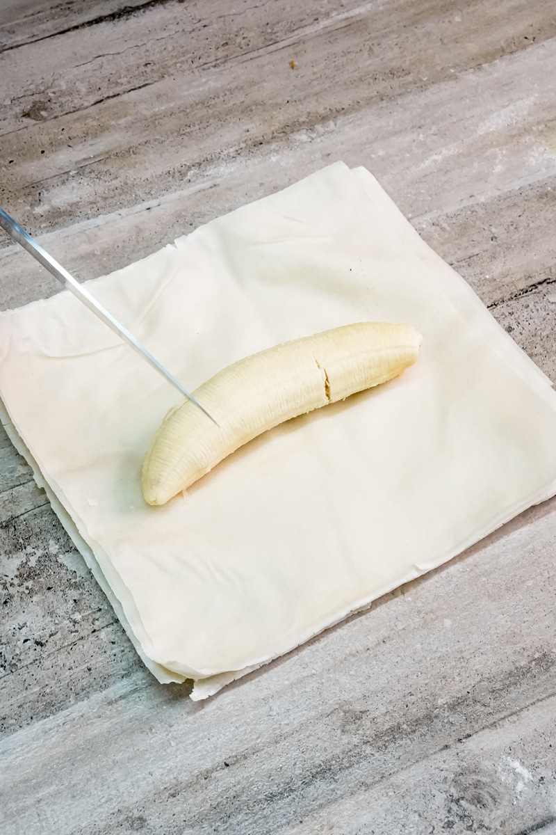 Fresh banana on parchment paper for banana strudel recipe