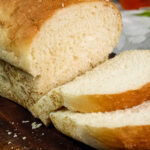 Freshly sliced English Muffin Bread showcasing its perfect texture for toasting.