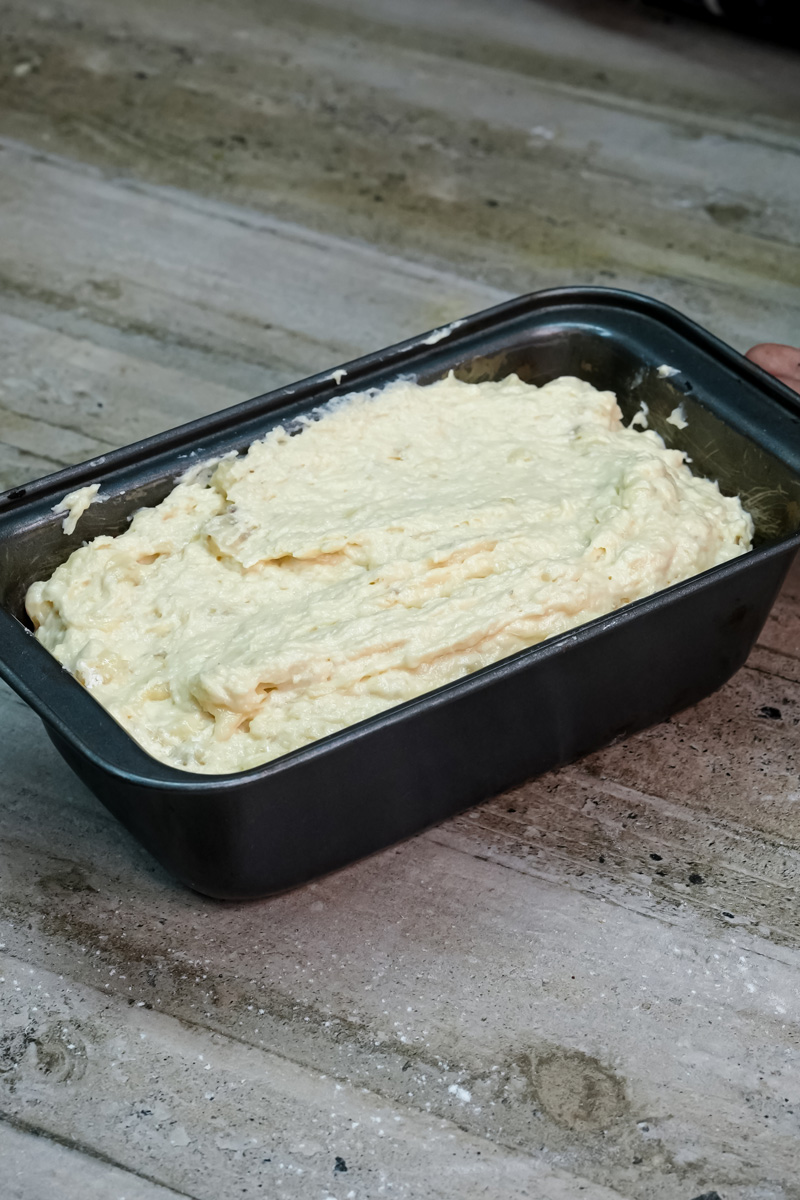 Hawaiian banana bread batter in a loaf pan, ready for the oven.