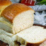 Sliced Japanese milk bread displaying characteristic fluffy texture