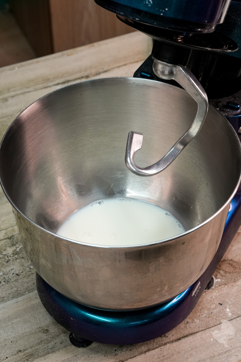 Milk in stand mixer bowl for Japanese bread dough preparation