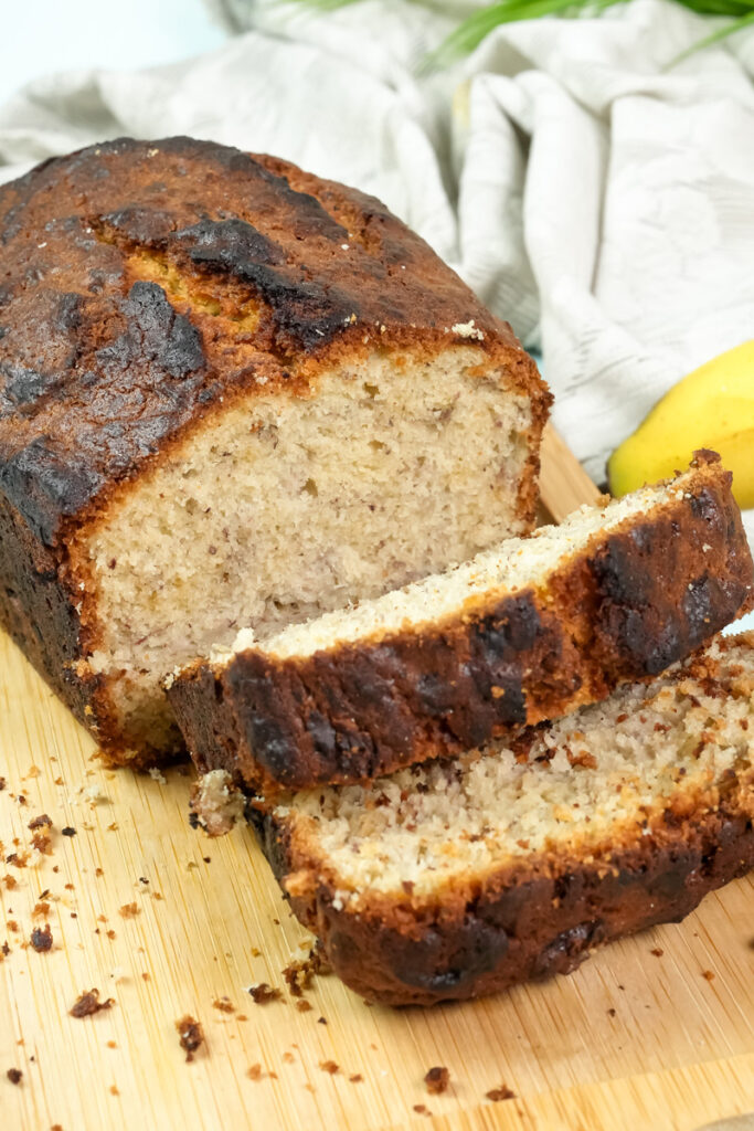Slices of moist, homemade Hawaiian banana bread ready to be served.