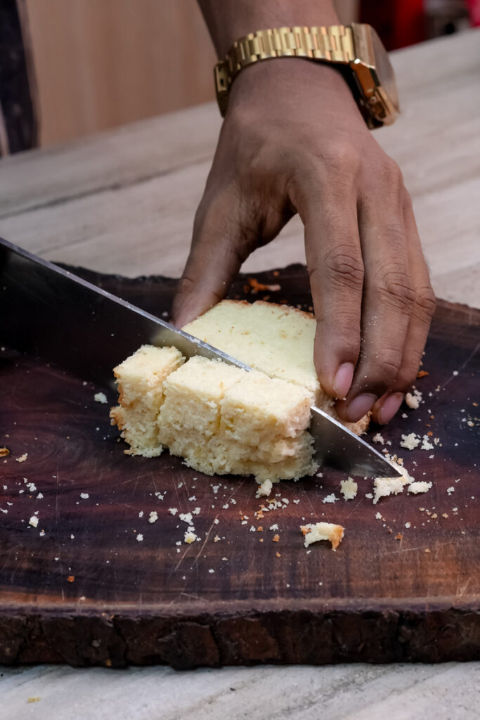 Slicing cake into uniform pieces for trifle assembly