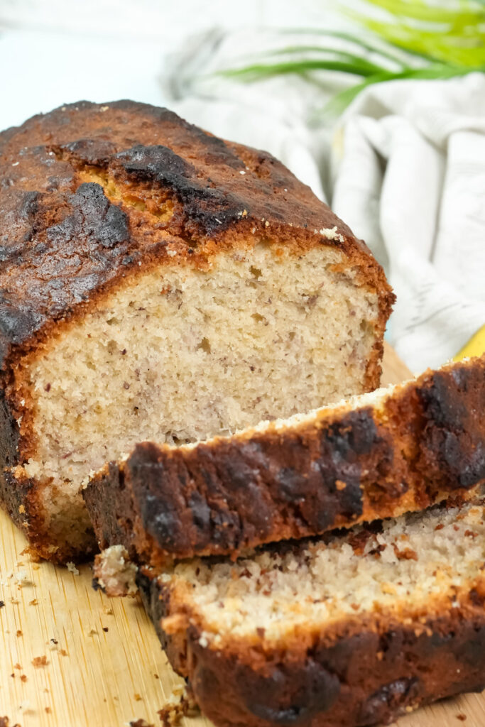 A close-up of sliced Hawaiian banana bread showing its soft and moist crumb.