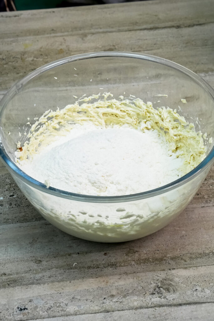 Adding flour and baking powder to the wet ingredients