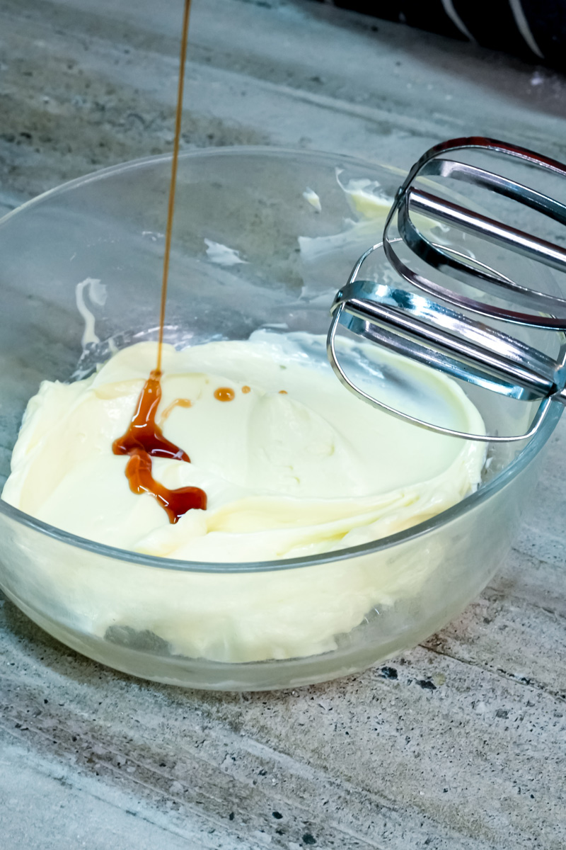 Adding vanilla extract to creamed butter mixture for shortbread cookies
