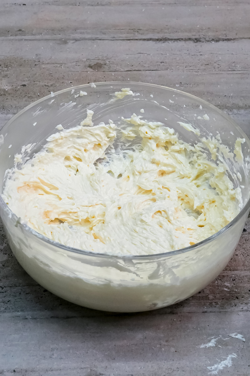 Creamed butter and sugar in a glass bowl