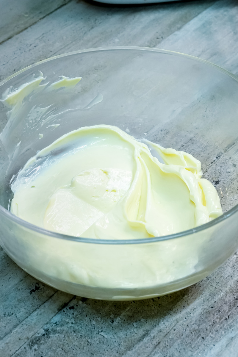 Creaming butter in glass mixing bowl for shortbread cookie recipe