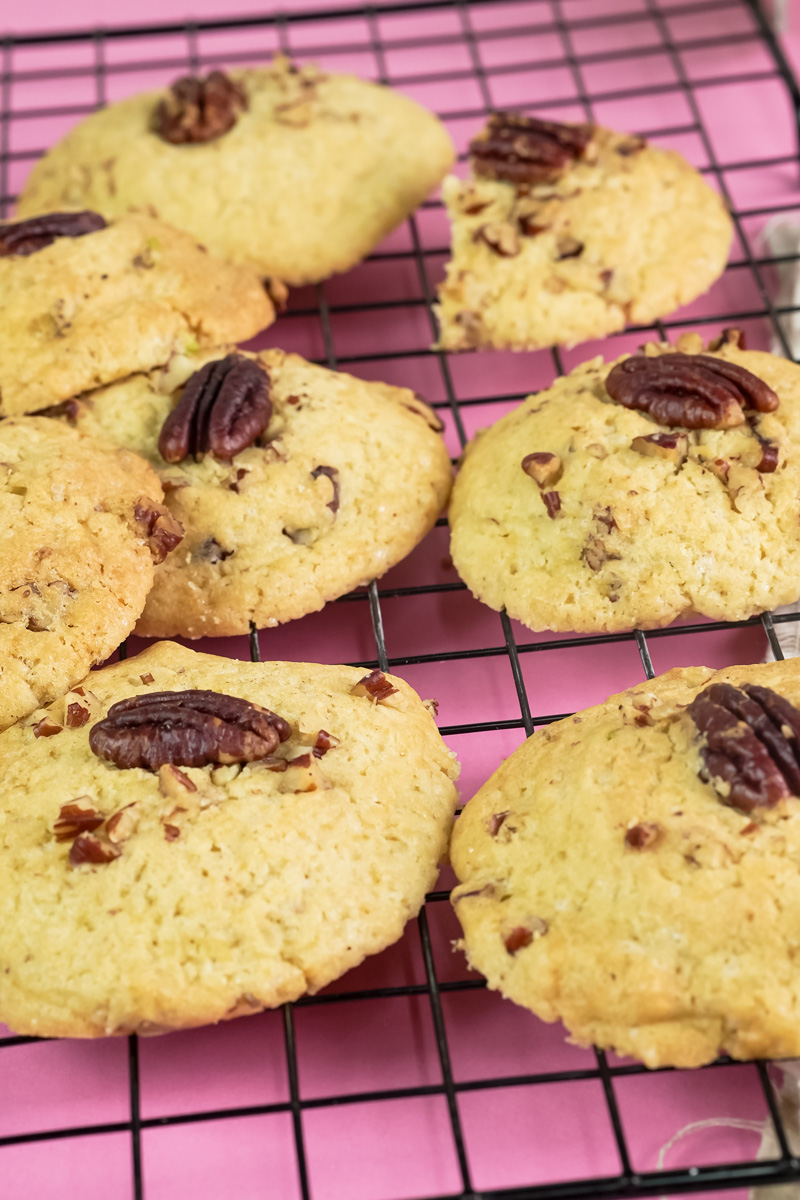 Freshly baked Pecan Pie cookies on a wire cooling rack