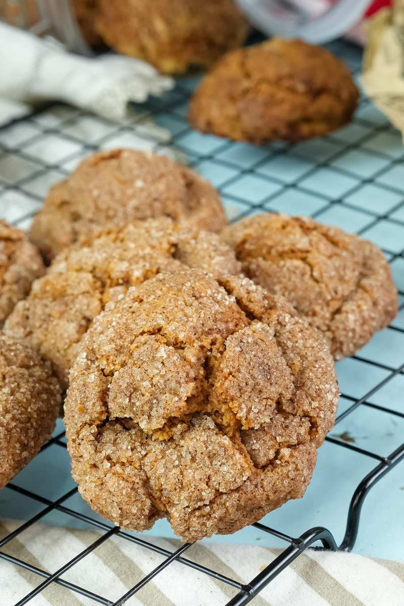 Freshly baked gingerbread cookies cooling on a wire rack