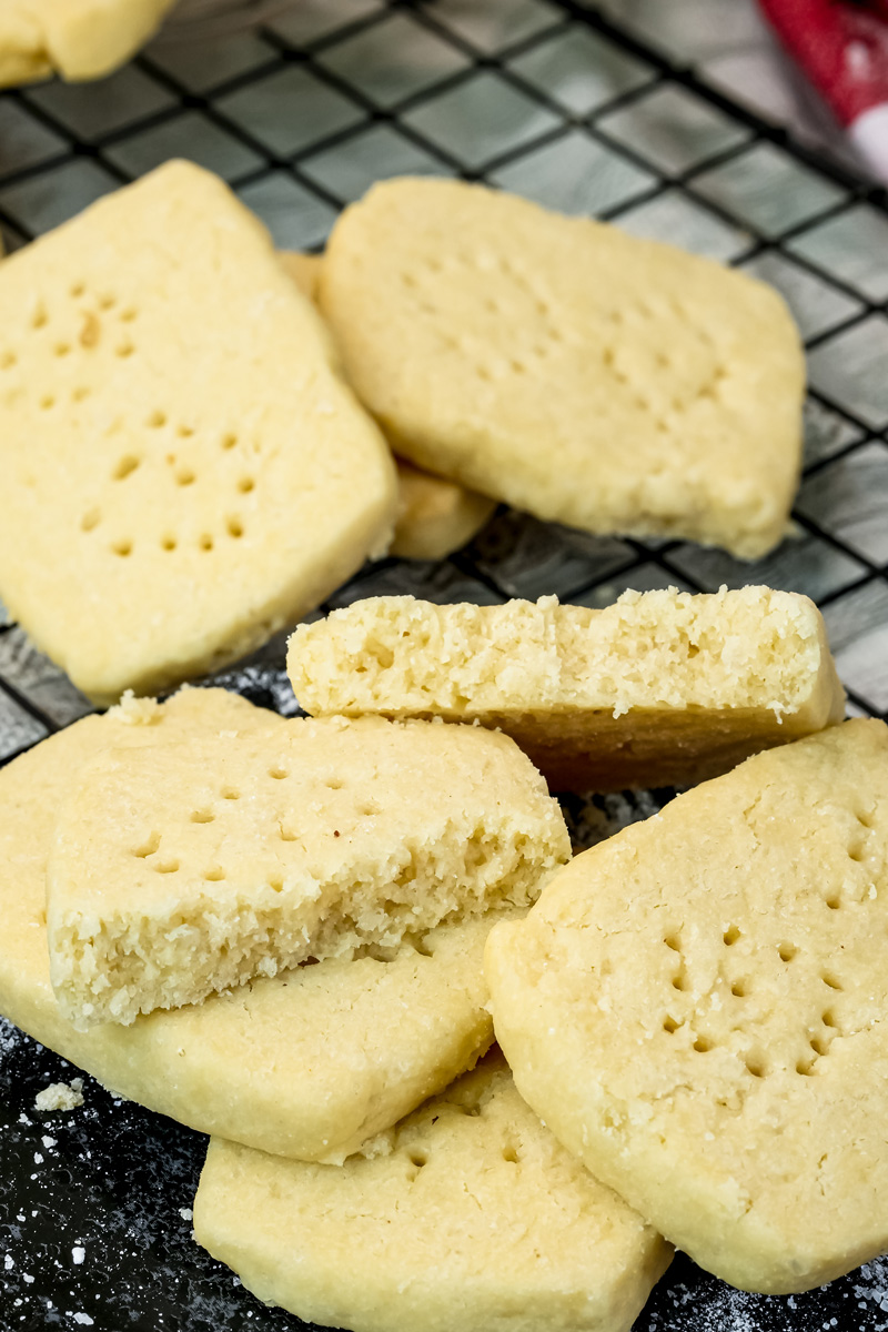 Freshly baked shortbread cookies cooling on wire rack showing buttery texture