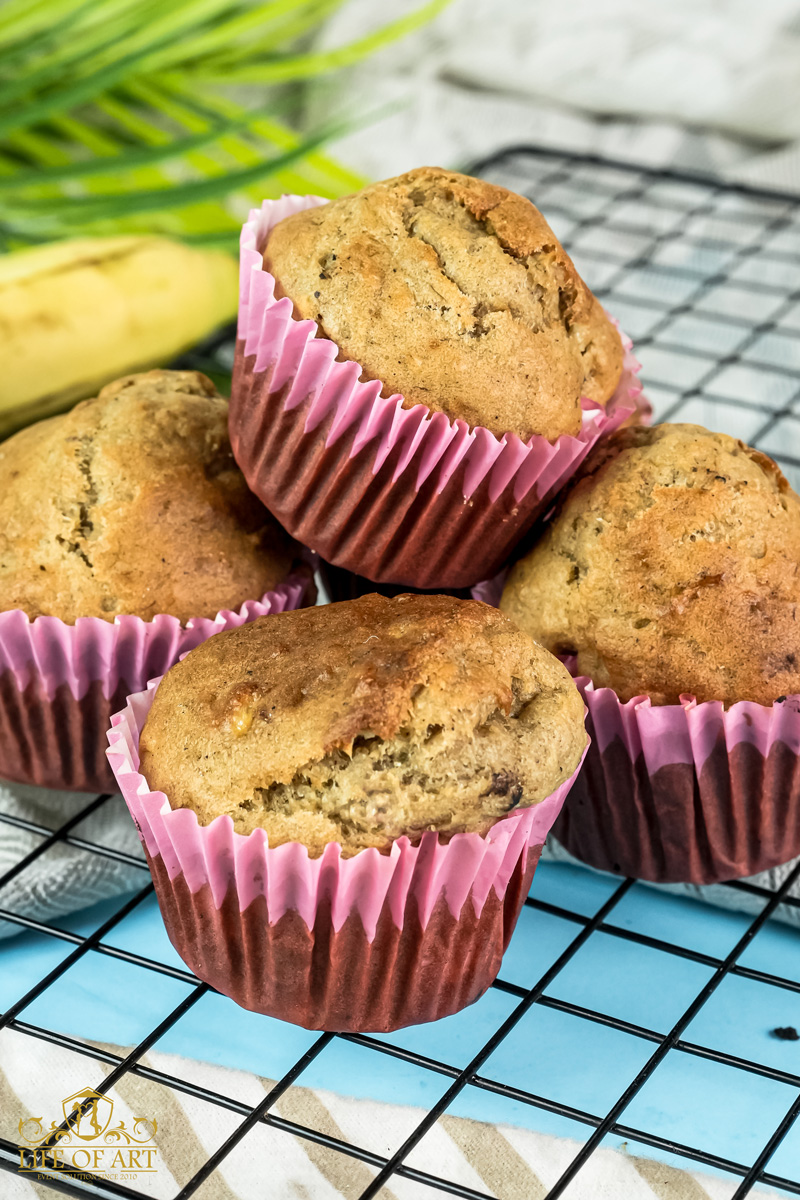 Homemade banana muffins on a cooling rack