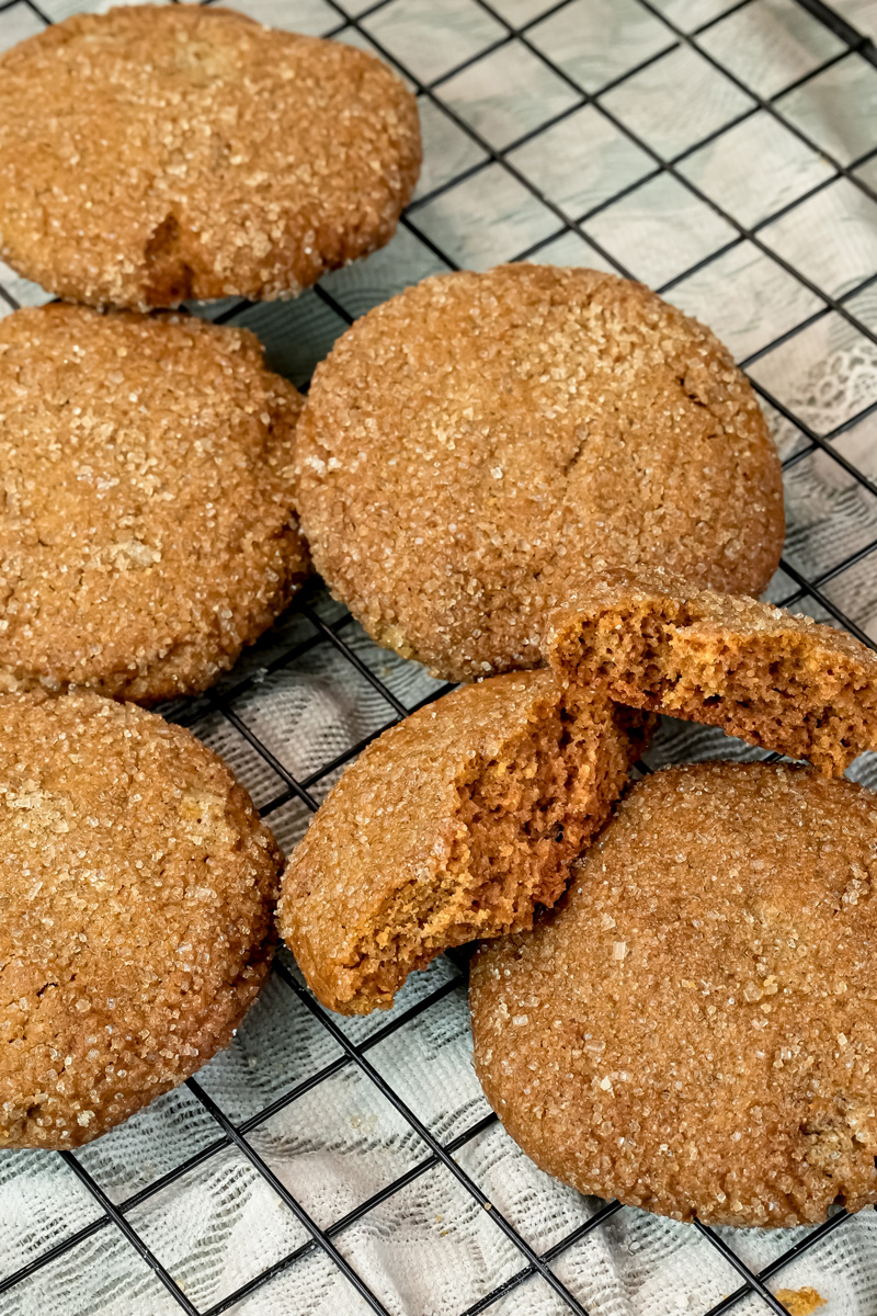 Homemade molasses cookies with crinkled tops and sugar coating