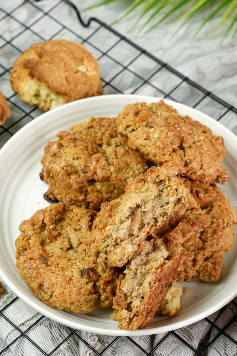 Homemade oatmeal raisin cookies served on white plate