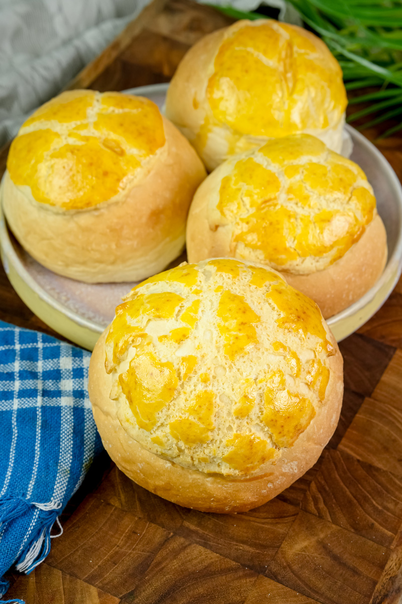 Homemade pineapple buns served on wooden plate
