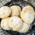 Overhead view of Mexican wedding cookies with heavy powdered sugar dusting