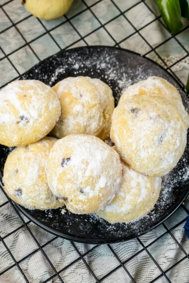 Overhead view of Mexican wedding cookies with heavy powdered sugar dusting