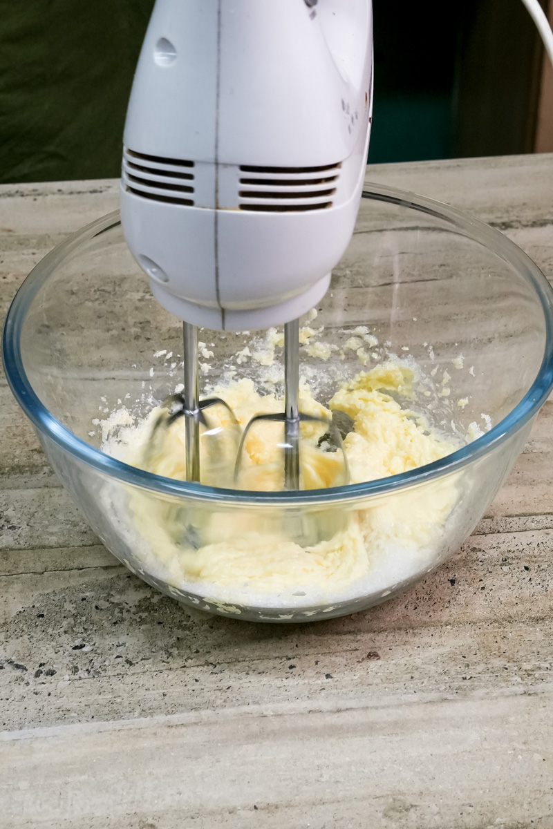 Mixing milk cookie dough with electric hand mixer