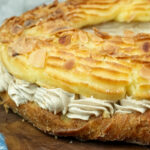 Close-up Paris Brest texture with almonds and golden crust