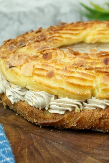 Close-up Paris Brest texture with almonds and golden crust