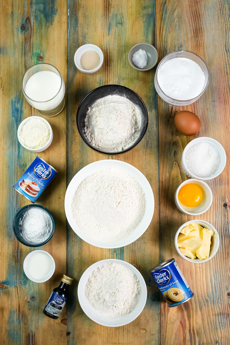 Pineapple bun recipe ingredients laid out on wooden table