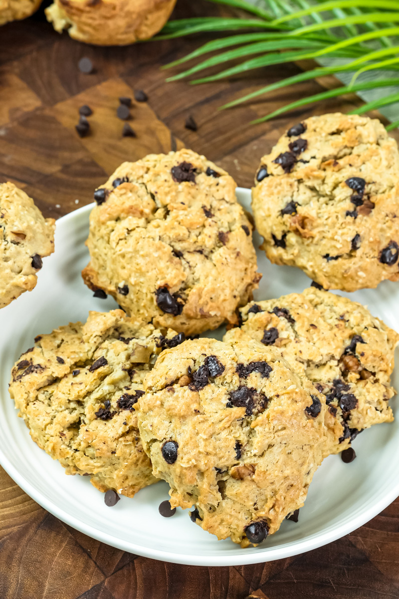 Plate of golden brown cowboy cookies with chocolate chips and nuts