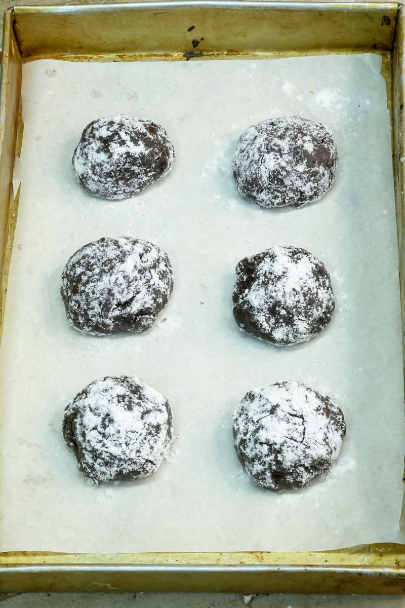 Close-up of the sticky, rich chocolate dough for crinkle cookies.