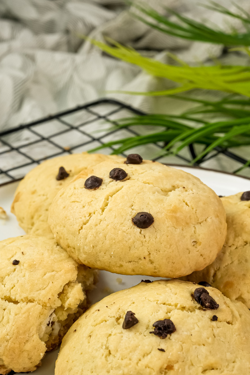 Soft baked cheesecake cookies with visible chocolate chips