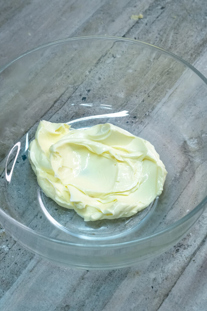 Softened butter in a mixing bowl
