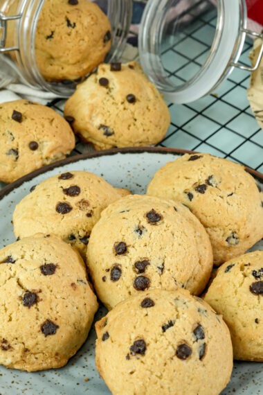 Close-up shot of baked chocolate chip cookies on a plate