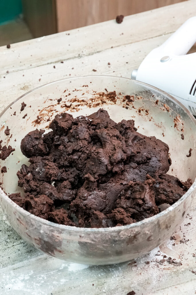 A bowl of chocolate cookie dough for homemade Oreos