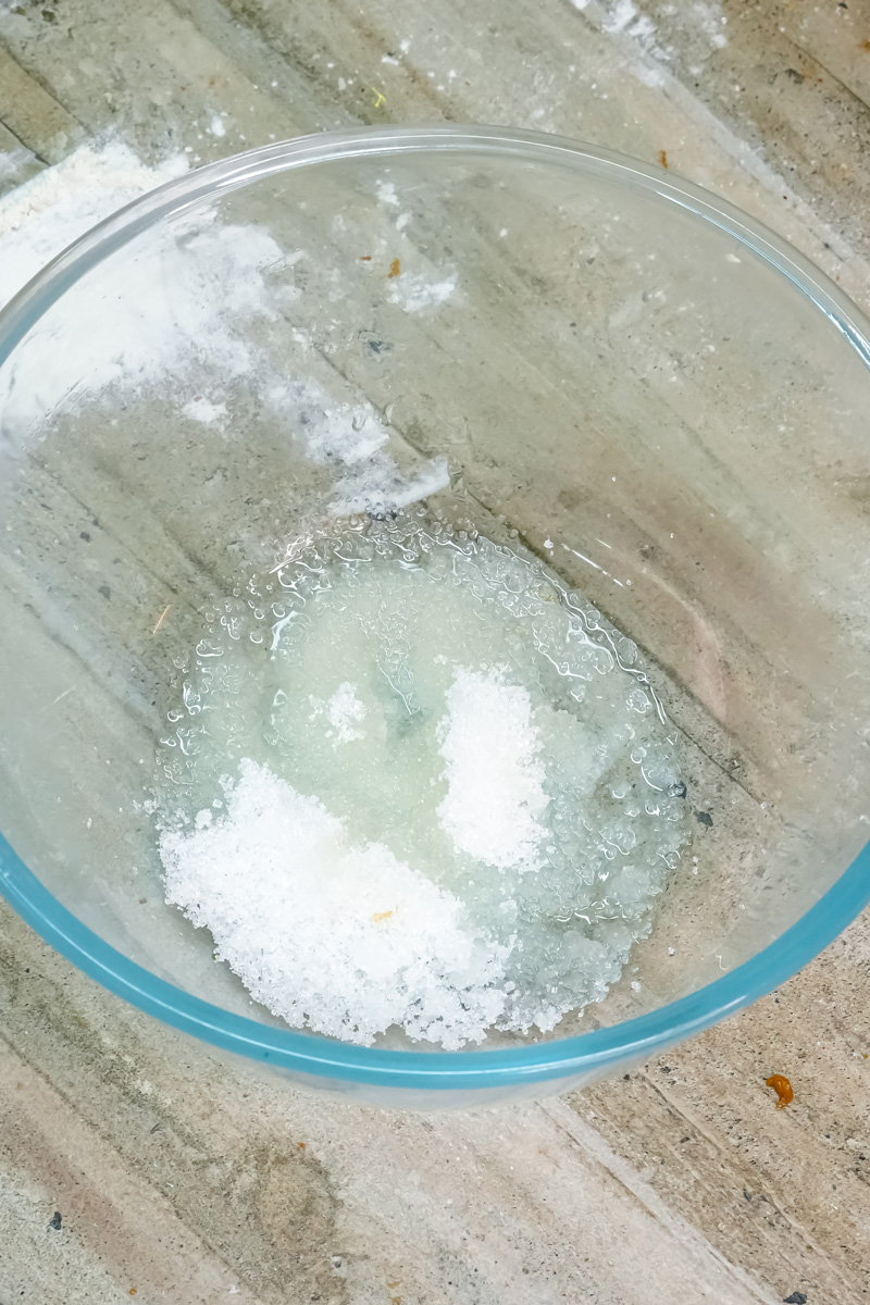 Close-up of melted butter and sugar in a glass bowl