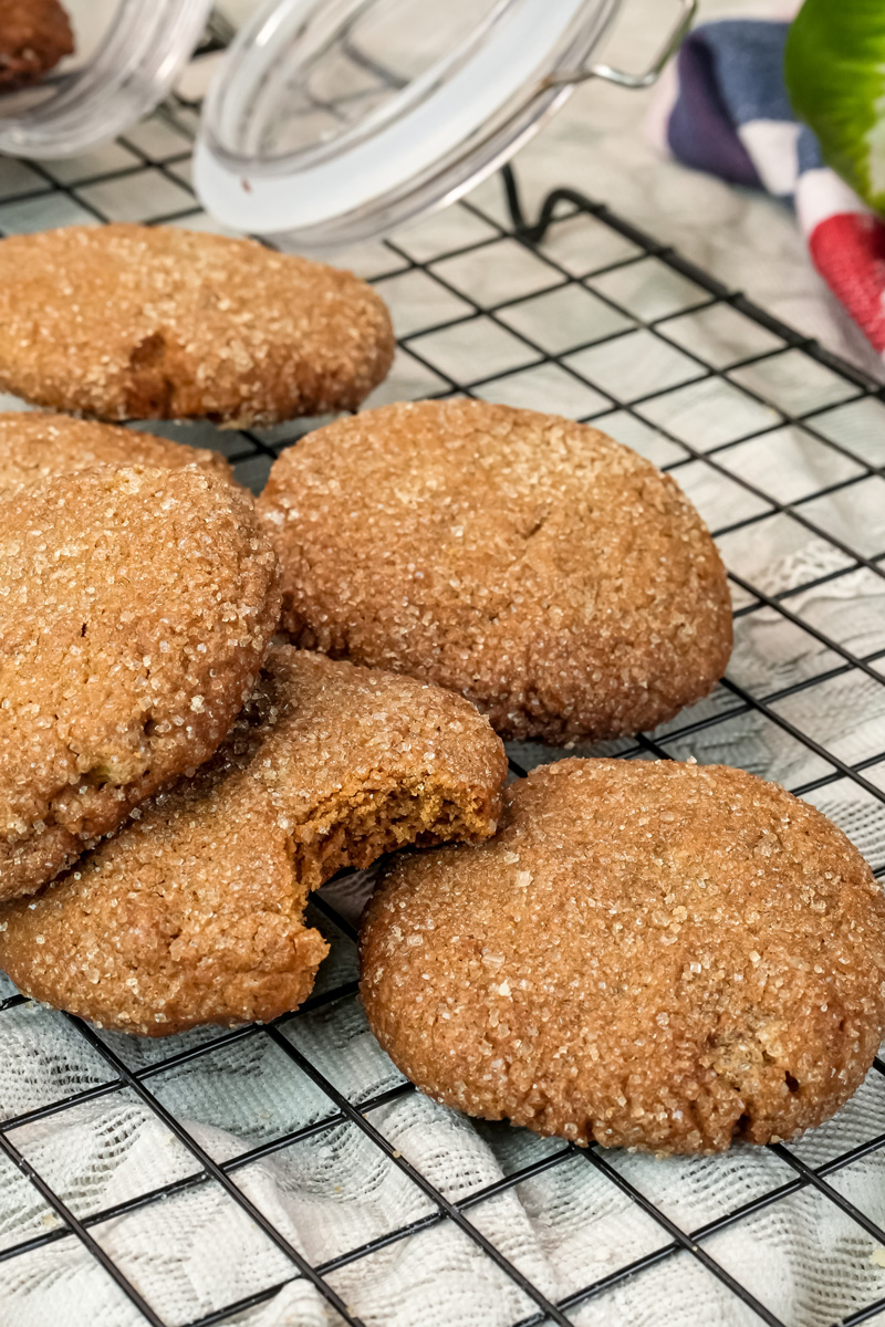 Freshly baked molasses cookies cooling on wire rack