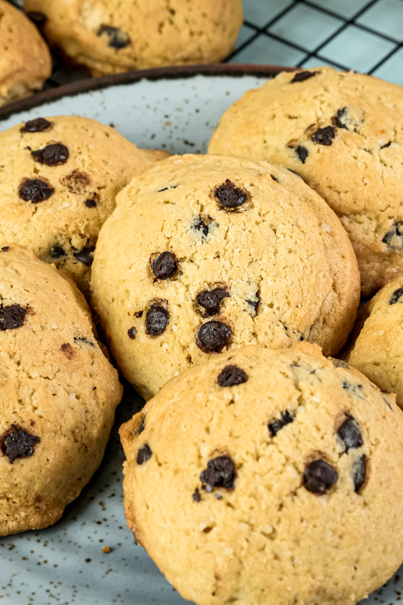 A close-up shot showing the texture of a baked chocolate chip cookie