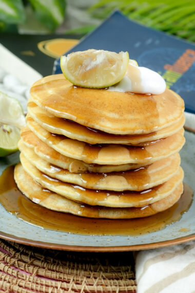 Delicious lemon breakfast pancakes ready to serve on a rustic plate