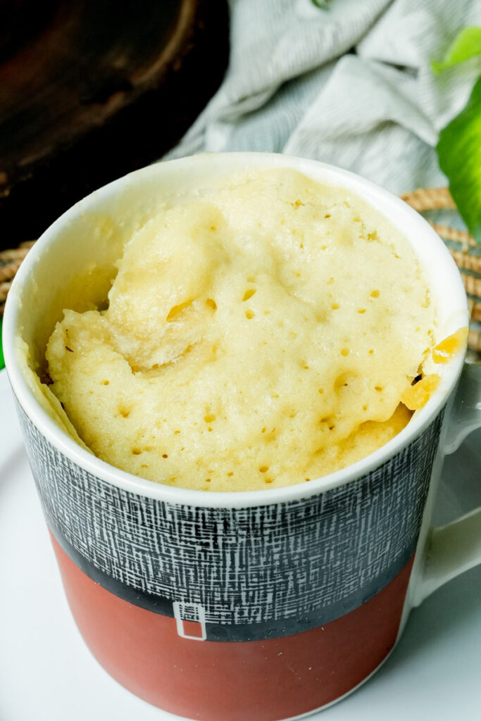 Homemade 1-minute vanilla mug cake ready to serve