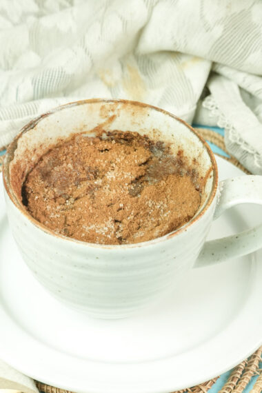 Homemade snickerdoodle mug cake with a crunchy cinnamon sugar topping