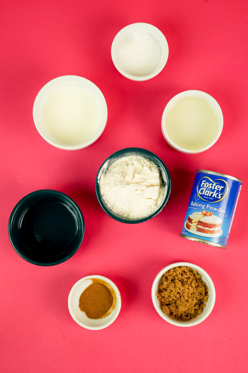 Ingredients for mug cinnamon roll: flour, sugar, cinnamon, and baking powder