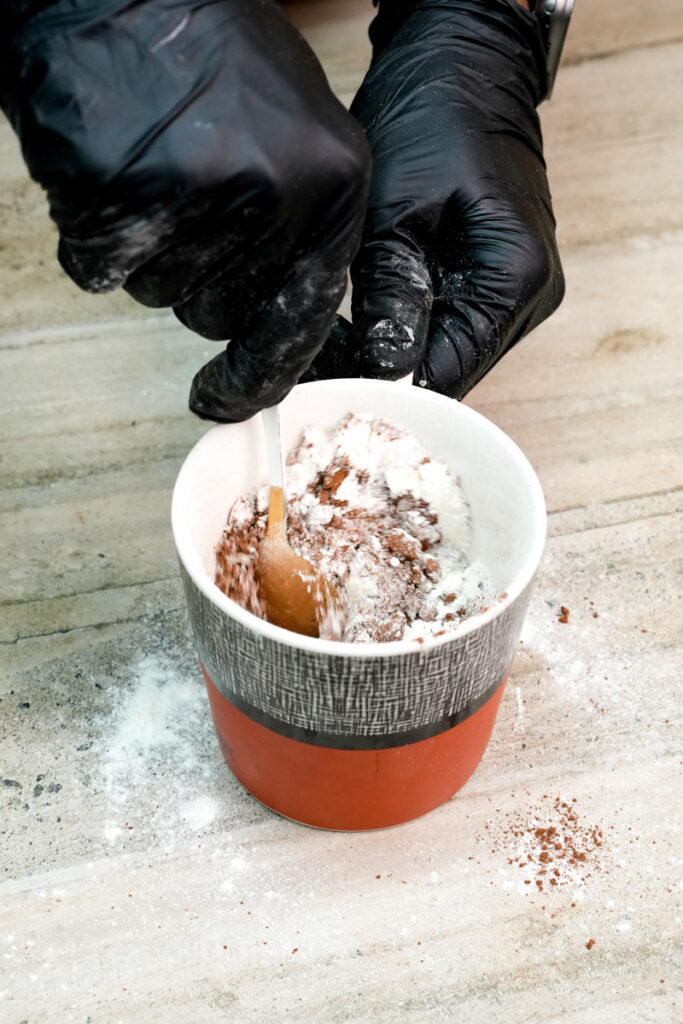 Mixing dry ingredients for a vegan chocolate mug cake