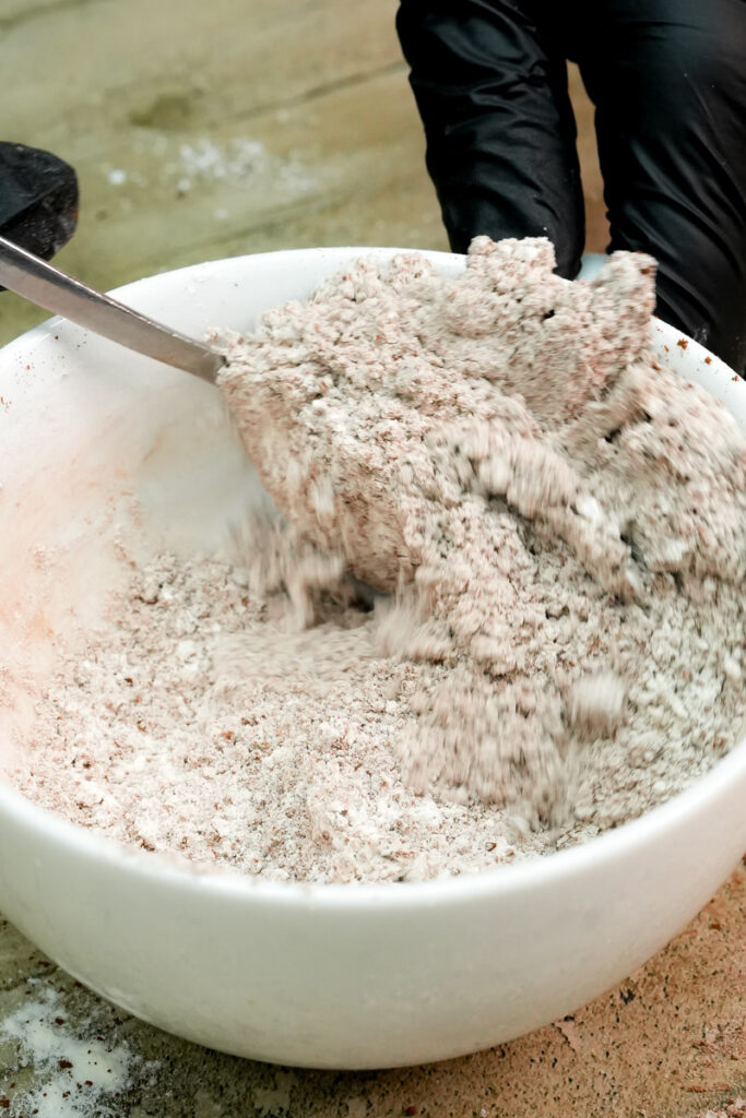 Mixing dry ingredients together for a consistent chocolate mug cake batter