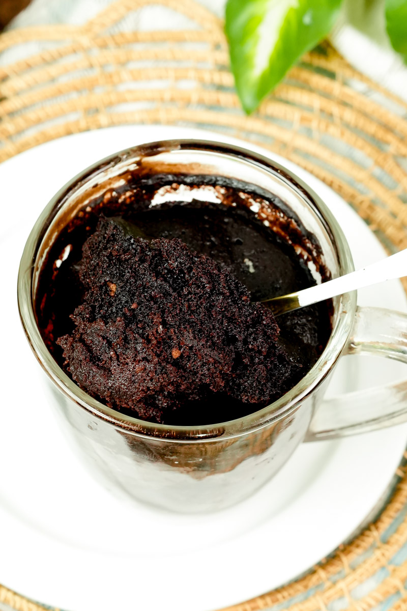 Scooping a bite of fluffy gluten-free chocolate mug cake