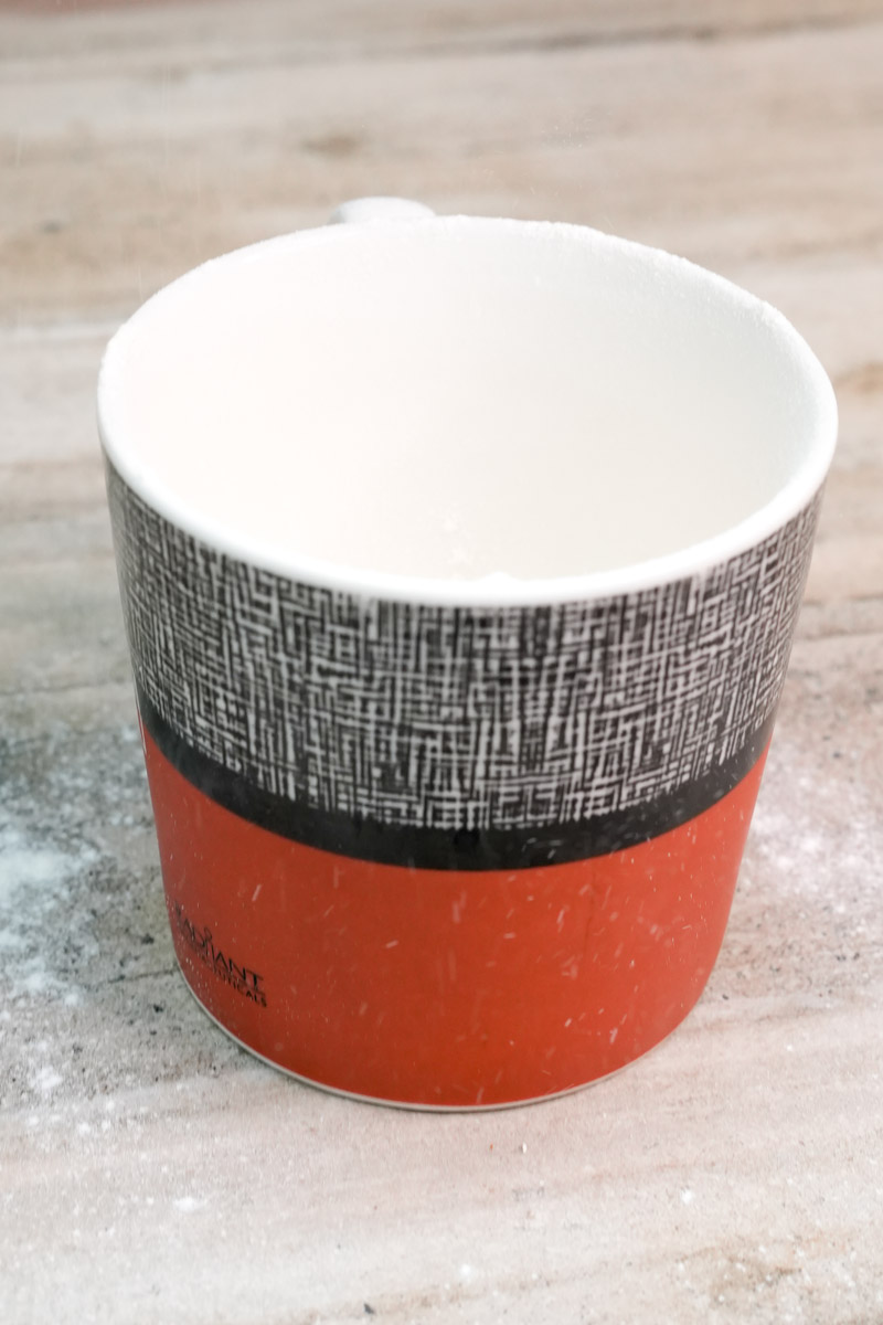 Empty ceramic mug ready for mug cake batter